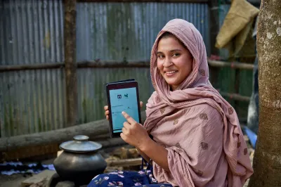 Girl showing her tablet