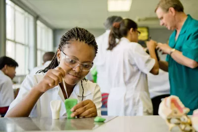 Nokulunga, a young woman in South Africa, learns skills in dentistry as part of the TechnoGirl programme..