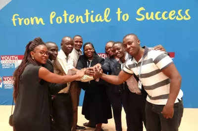 A group celebrates at the Youth Connekt conference.