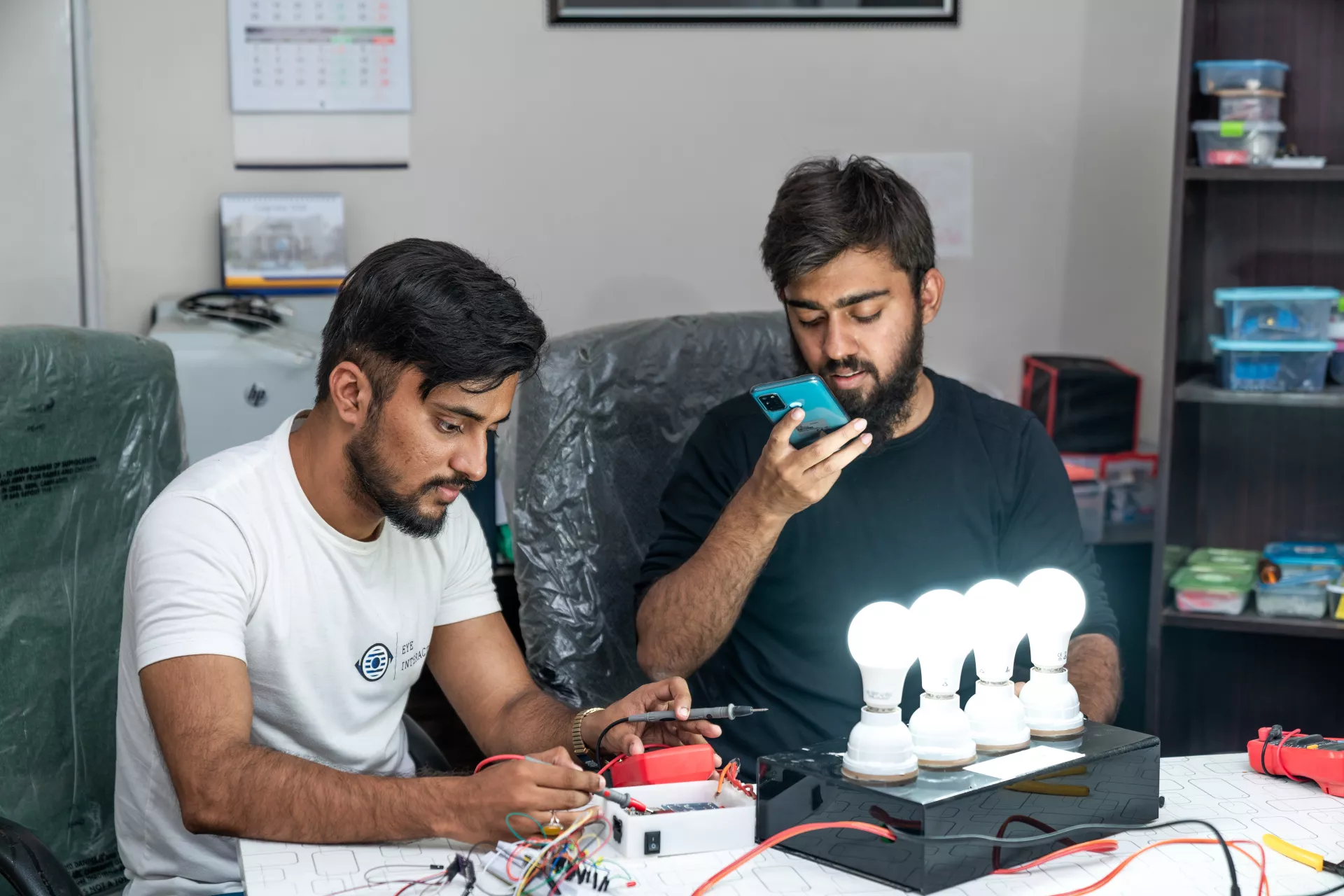 Captured in this photo are the bright minds of the winners of the Imagen Ventures Youth Challenge, as they experiment with light bulbs and technology