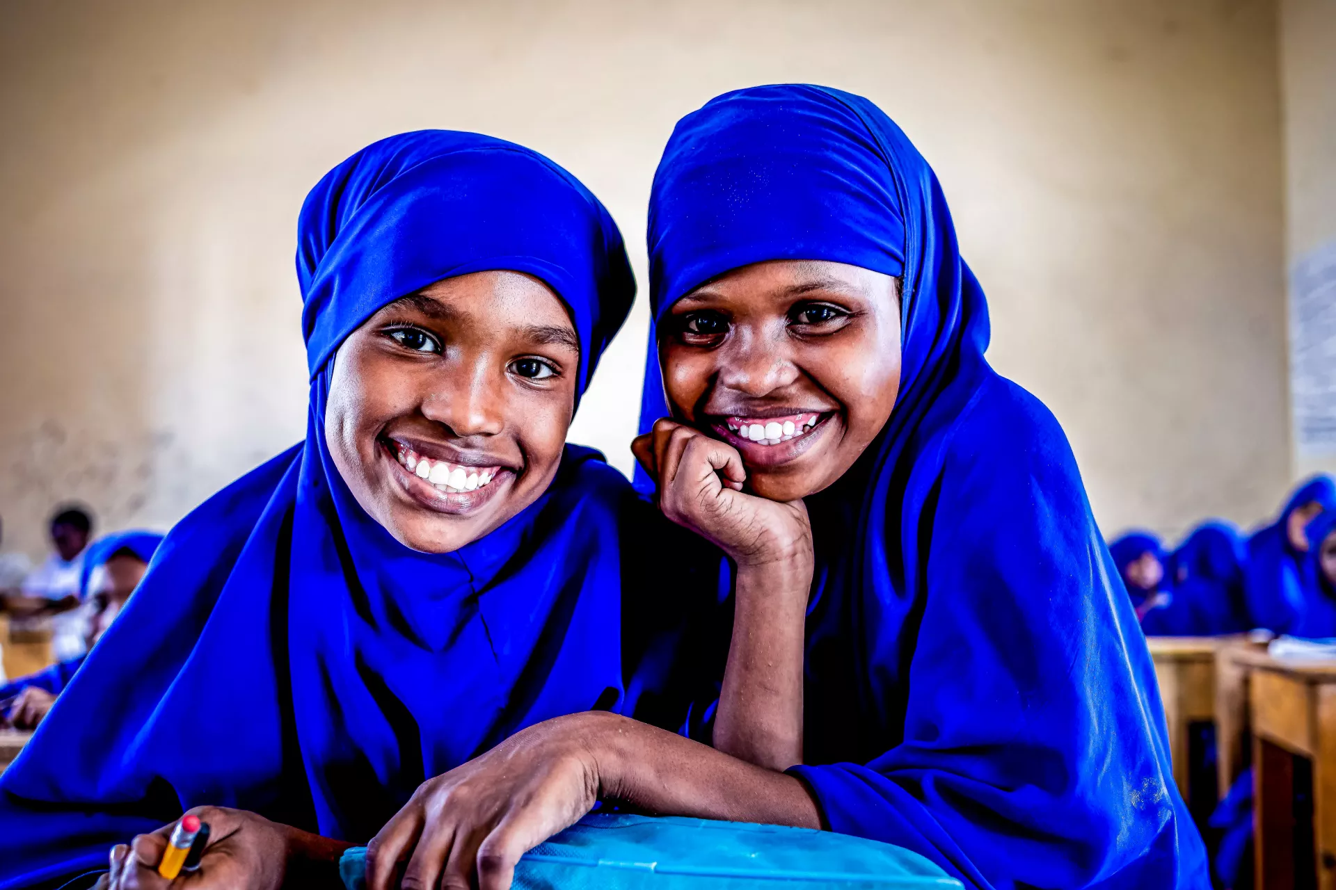Halimo Abdirahman Ismail, 12 years old, and her friend attend class in Mogadishu, Somalia on 23 January 2021.