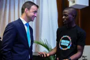Kevin Frey engages with a young person in Nigeria in 2021, listening to their experiences, aspirations, and ideas for the future.