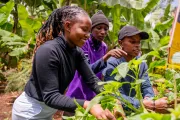 Grace Nyawira and Kennedy Gachoka, agripreneurs, Kenya, engaging students on farming methods and nutrition using demo plots set up in schools within local communities.