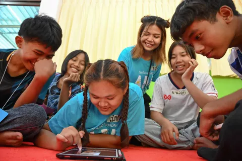 Young people and UNICEF volunteers edit videos capturing local culture.