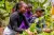 Grace interacting with learners in the farm
