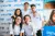 A group of young volunteers from Colombia pose for a picture in front of a UNICEF banner