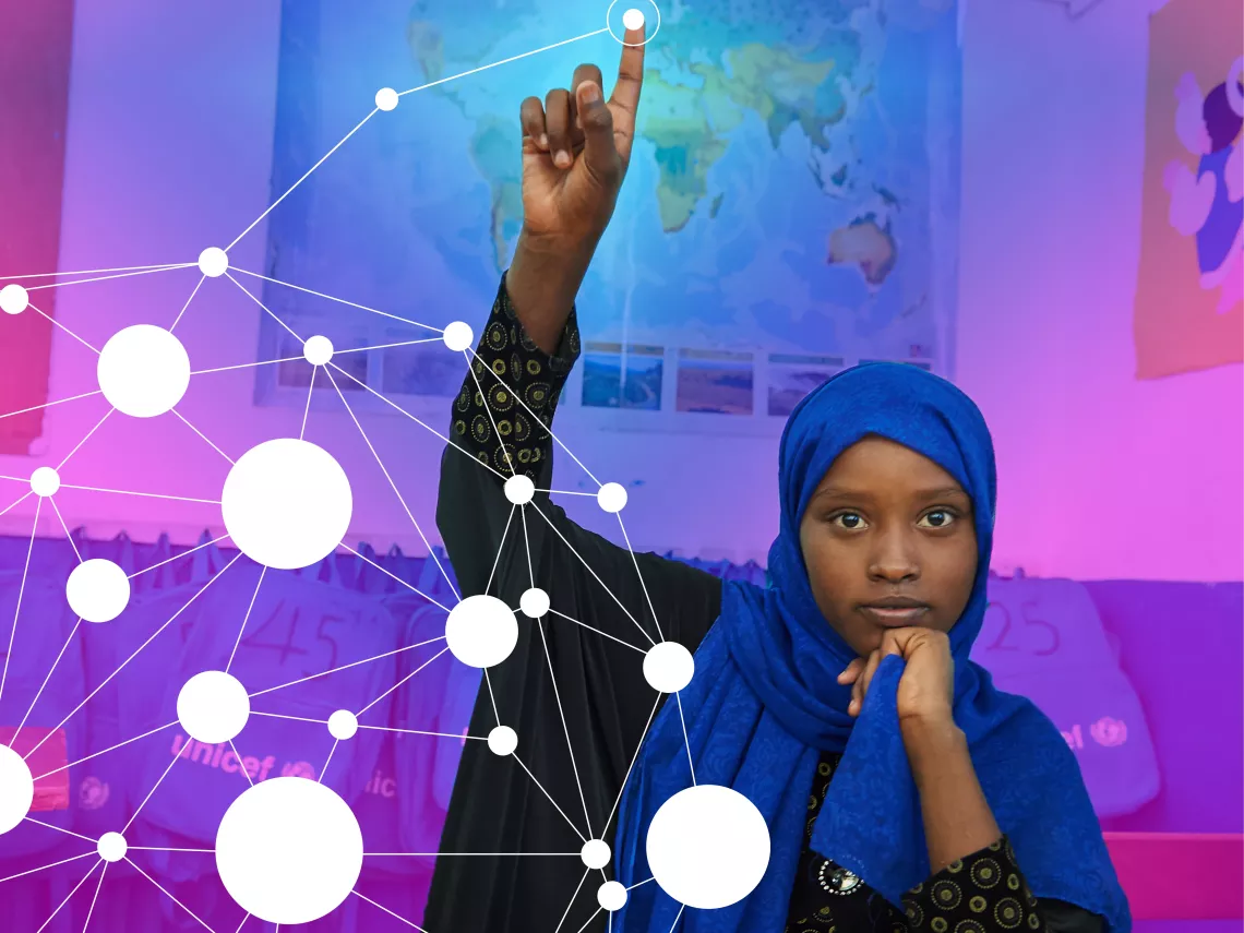 A girl raises her hand in class in Djibouti.