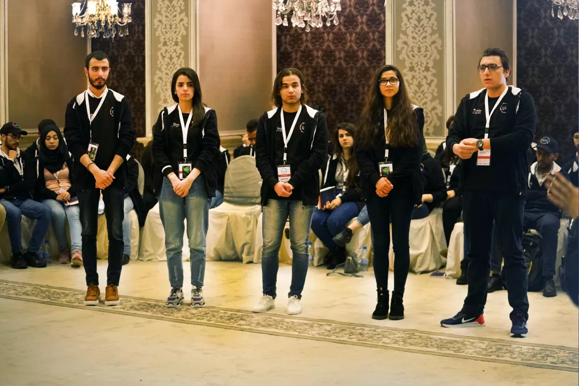 (Left-to-right) Hasan, Rasha, Ahed, Aya, and Mohammad, founders of CreaDeaf pitching at the GenU Youth Challenge Workshop in Damascus, Syria