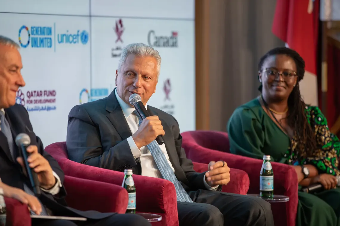 Aiman Ezzat Speaking during a panel discussion.