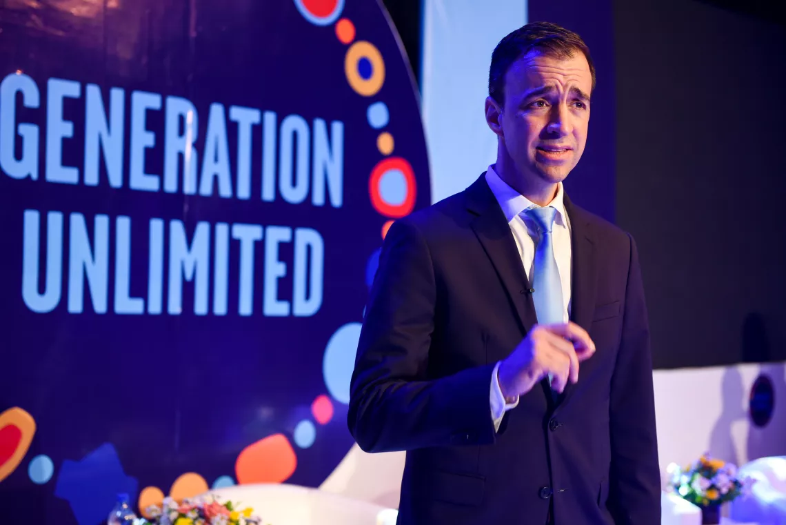 GenU CEO Kevin Frey shown on stage during his speech at the launching event of Generation Unlimited Nigeria.