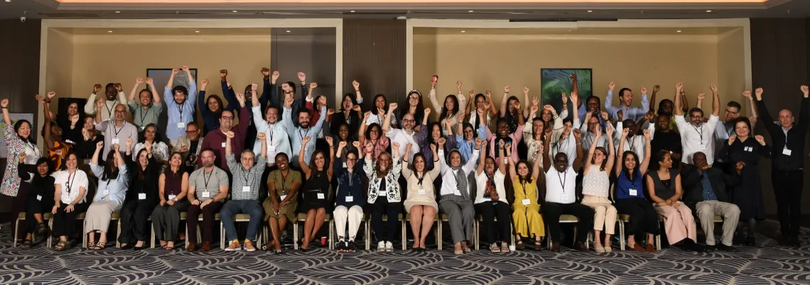 Photo of all the participants waving
