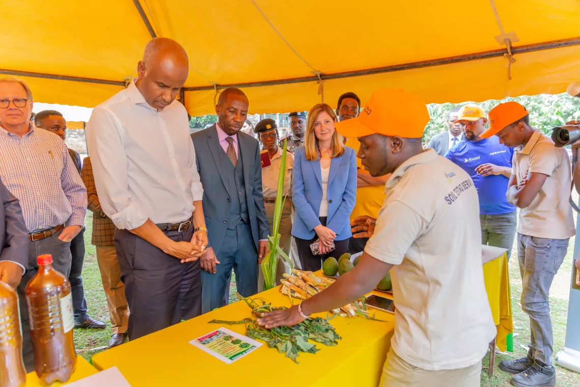 Canadian Minister of International Development Hon. Ahmed Hussen shown engaging with young people during his Kirinyaga, Kenya, in 2023, to understand how the EKYAN programme engages youth in agriculture. 