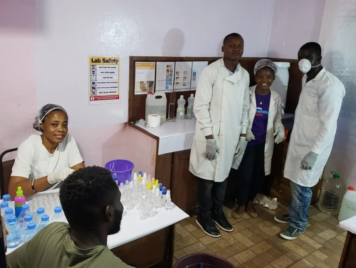 The Local Youth Corner Cameroom team in their laboratory.