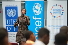 A young girl frim Ghana speaks up at a GenU workshop.