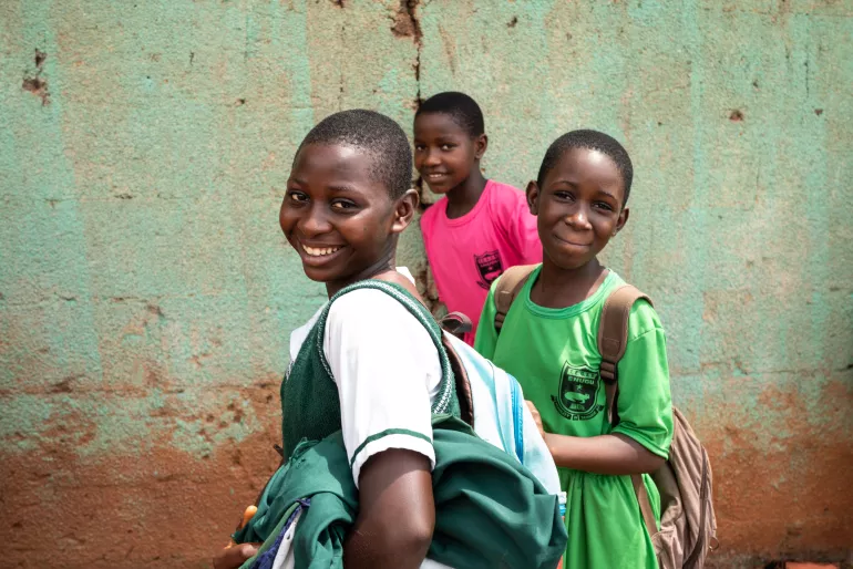 Students outside of class at a secondary school in Enugu.