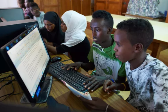 Youth work together at a inclusive computer education class at the LEC of Ali-Sabbieh in Djibouti.